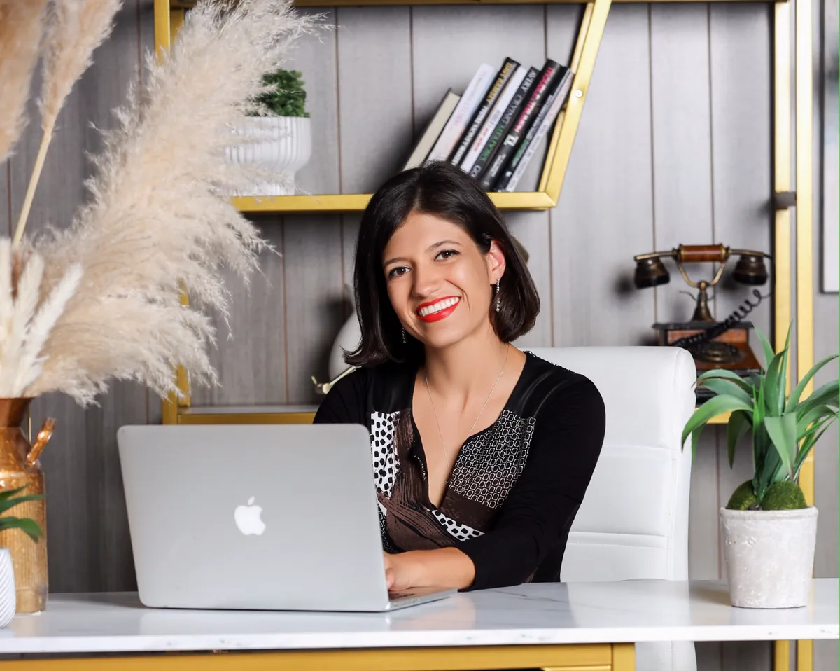 Natalie Lopez, Fort Lauderdale attorney, at her office desk
