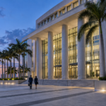 Modern federal courthouse exterior in South Florida at blue hour